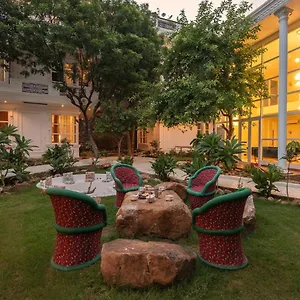 Villa Stayvista's Indraj Manor - Roman-inspired With Posh Interiors, Mesmerizing Garden & Outdoor Fireplace, New Delhi